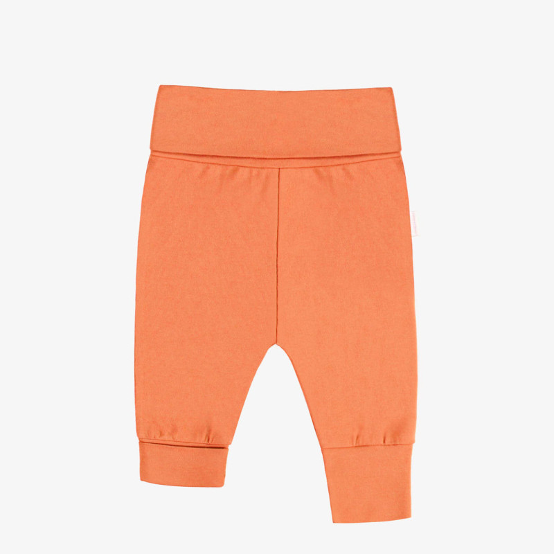 Plain orange evolutive pants in stretch jersey, baby