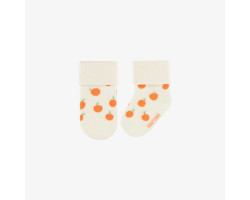 Cream stretch socks with small oranges, newborn