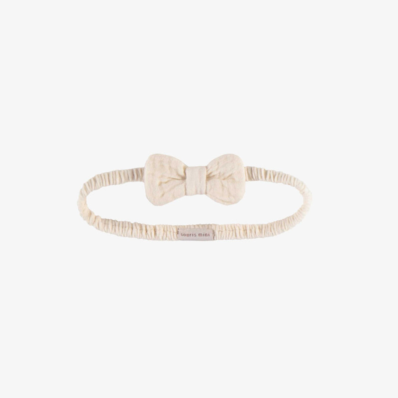 Cream elastic headband with a bow, baby