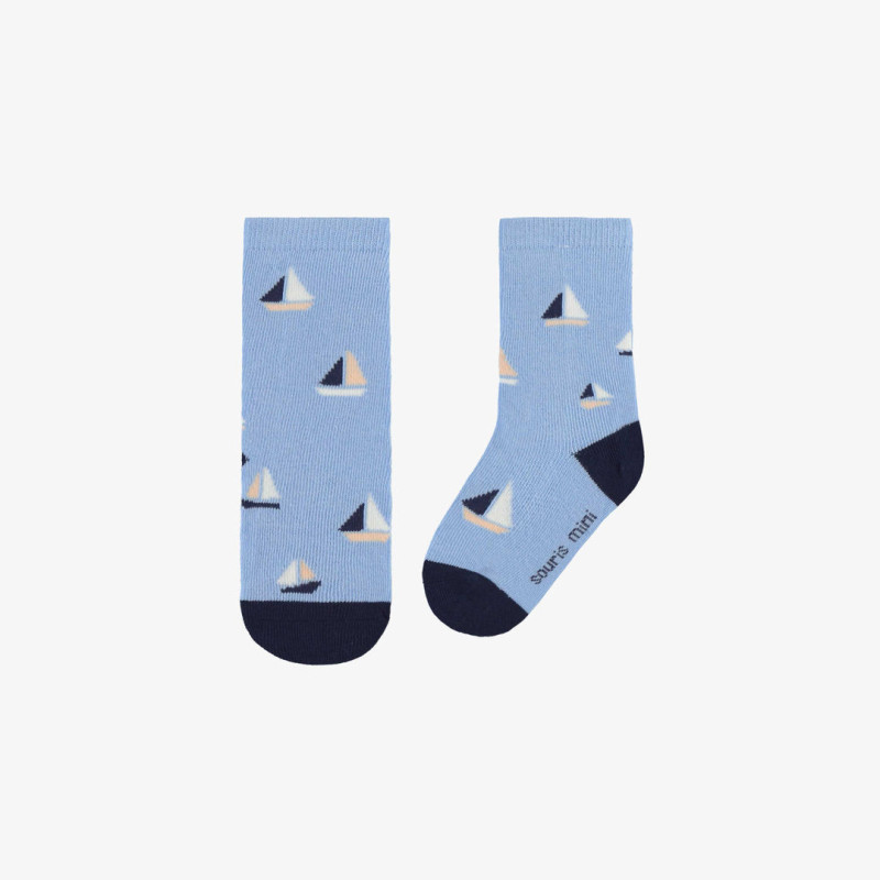 Light blue socks with a sailboat print, baby