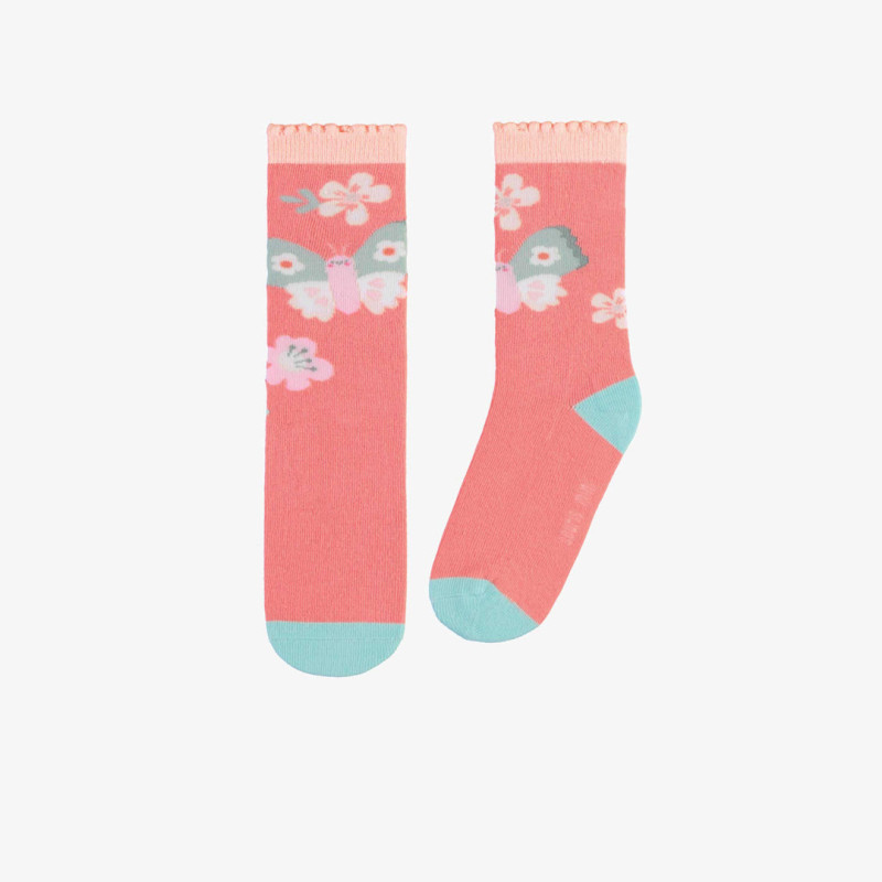 Pink socks with colorful butterfly and flowers, child