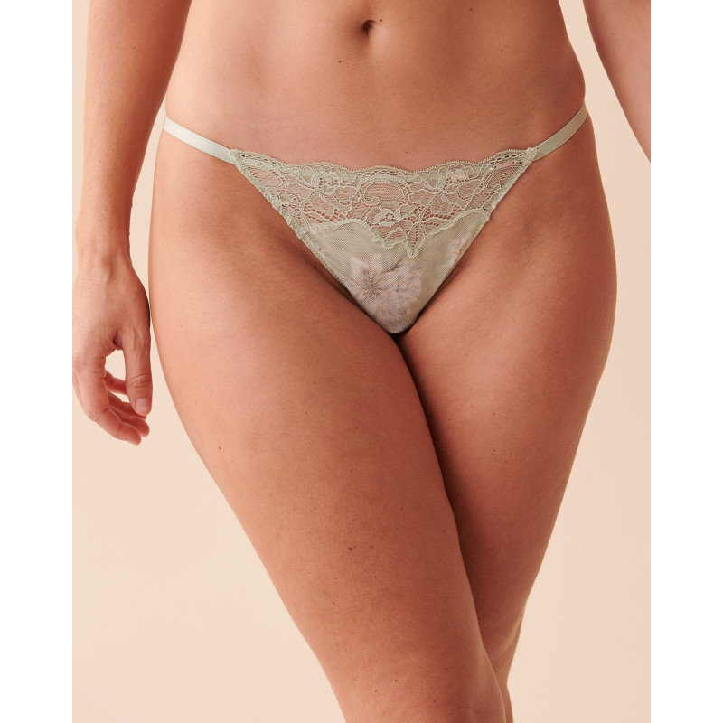 Culotte string ajustable en dentelle et résille