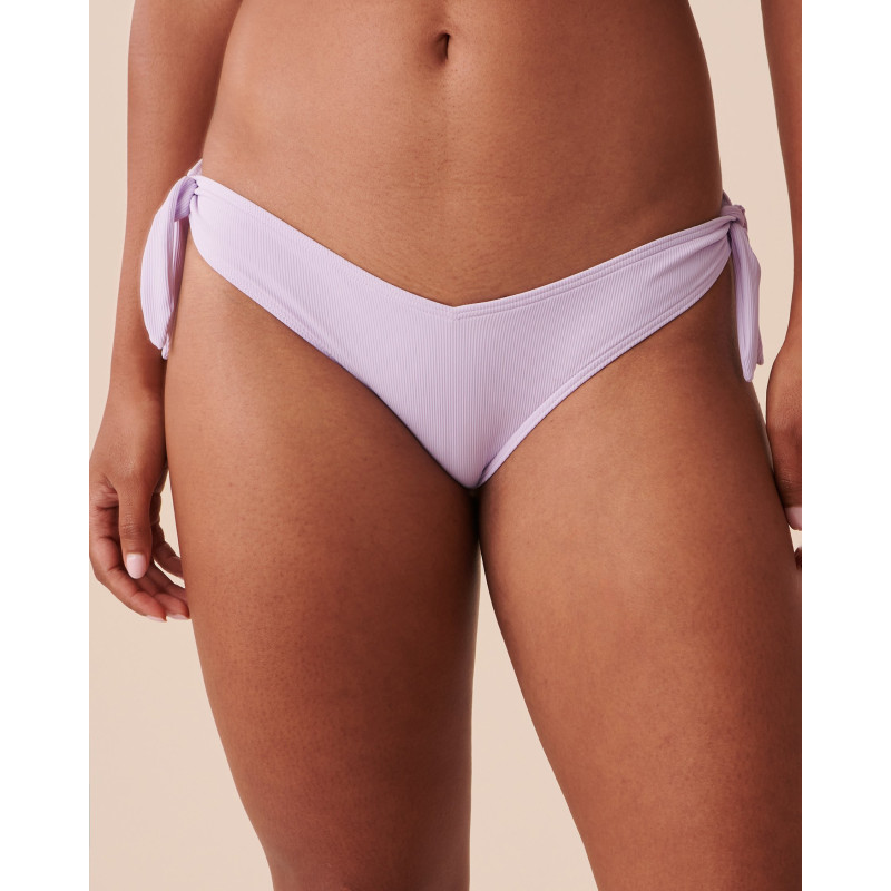 Bas de bikini brésilien coupe en V noué aux hanches texturé PASTEL